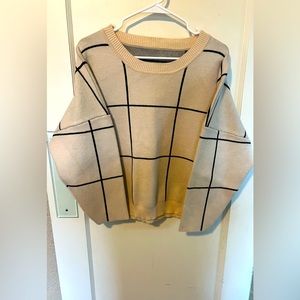 Nice thick sweater, Cream and black windowpane plaid. No tags.